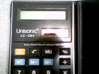 Unisonic LC 384 Dual Power Solar And Battery Back Up Calculator w/FORD Case (Unisonic Calculator #LC 384) : Office Products