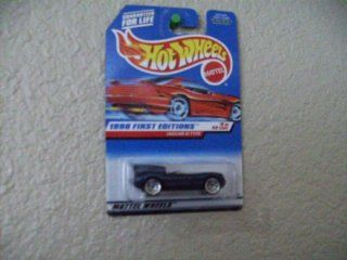 Hot Wheels Jaguar D Type #638 1998 First Editions on Red Card Wire Spoke Wheels: Toys & Games