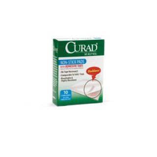 Curad Non Stick Pad with Adhesive Tabs (Case of 12) Size 2" x 3"  Bandaging Pads  Beauty