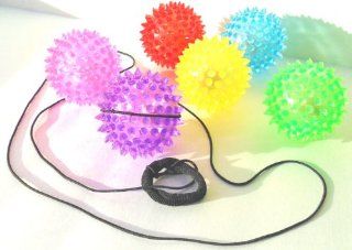 Blinking Bungee Ball is Ball on a String Kids Coordination Game Set of 4 Assorted Colors: Toys & Games