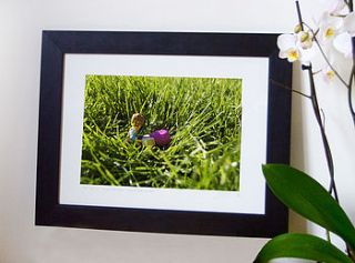 framed toy figure grass photo print by kym haverson