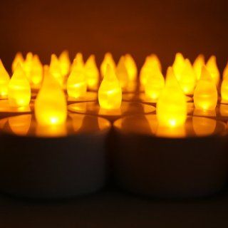 Shop BlueDot Trading LED Battery Operated Flameless Flickering Tea Lights, Amber, 24 Pack at the  Home Dcor Store