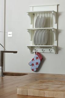 wooden plate rack wall shelf by the orchard