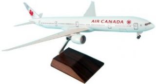Daron Skymarks Air Canada B777 300Er Model Kit with Gear and Wood (1/200 Scale): Toys & Games