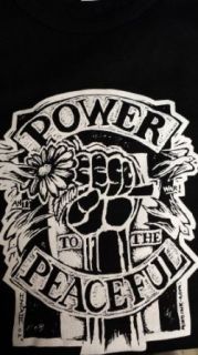 Spearhead with Michael Franti   Girls Shirt   Power to the Peaceful (Fist Holding Daisies, White on Black). On Upper Rear of Shirt is "MICHAEL FRANTI & SPEARHEAD" right below neck. Size Small.: Clothing