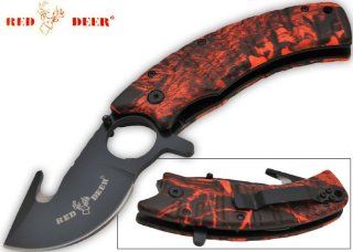 RDX 9805. 7.5 Inch Red Deer Trigger Assisted Knife   Red Camo What would be the perfect knife to take on your deer hunting conquests? Look no further: our exclusive Red Deer knife with it's specialty made blade is all you need gut that deer folding kni