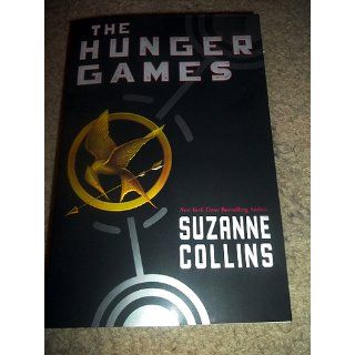 The Hunger Games (Book 1): Suzanne Collins: 9780439023528: Books