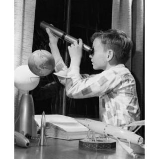 Boy looking through a telescope Poster Print (18 x 24)